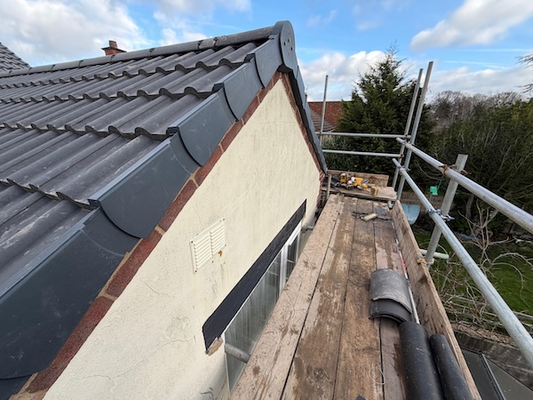 Finished roofing project with new tiles in Leicestershire